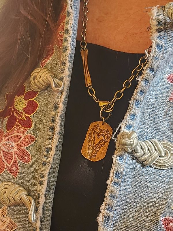 wearing vintage heart tag necklace