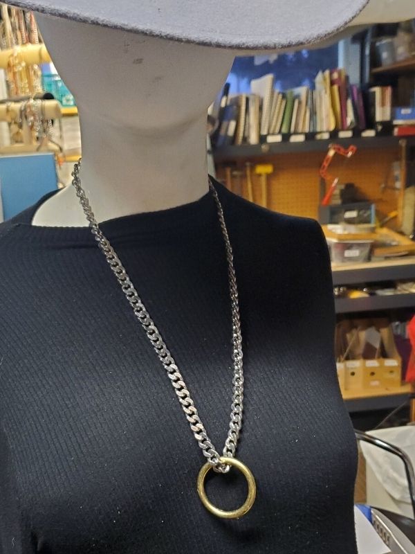 silver statement necklace on mannequin