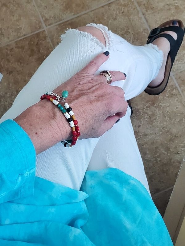 wearing colorful gemstone bracelets