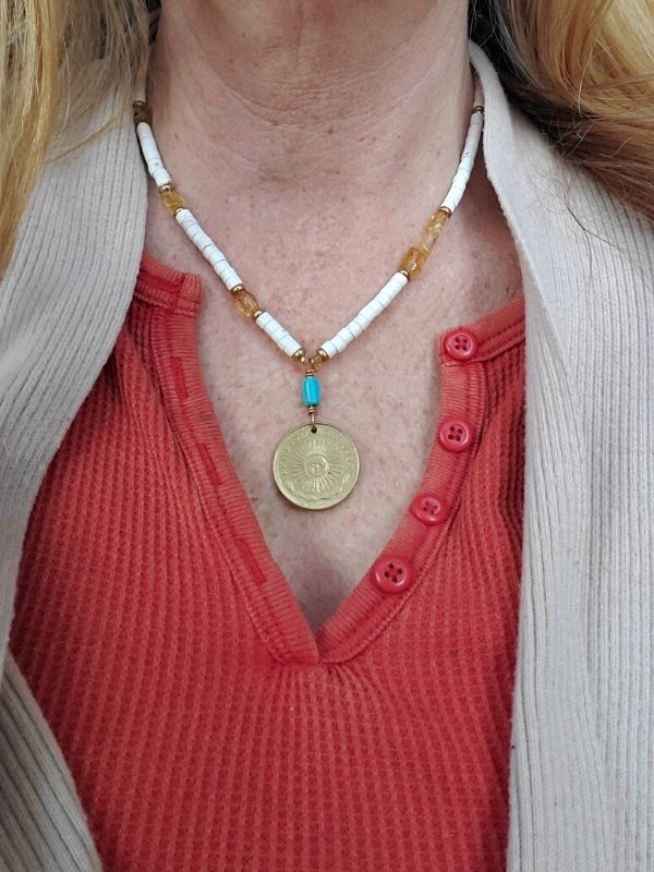 wearing colorful beaded Argentina coin necklace