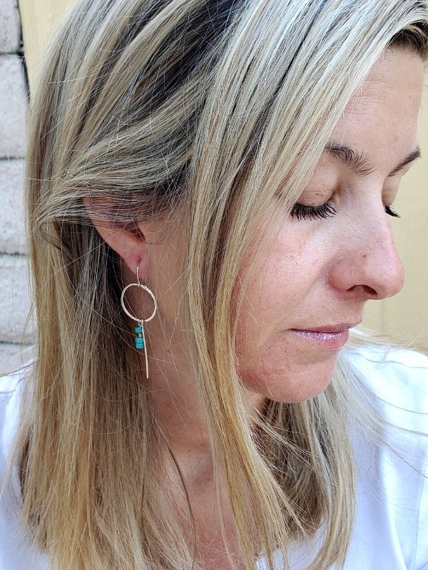 turquoise silver hoop earrings on side view female