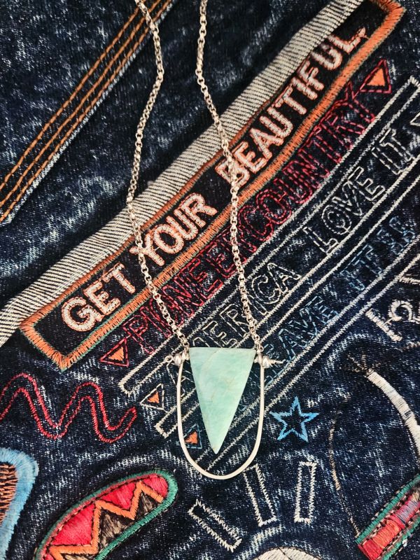 amazonite pendant necklace on edgy denim jacket