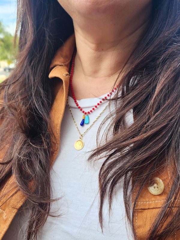 colorful little necklace on brown hair model