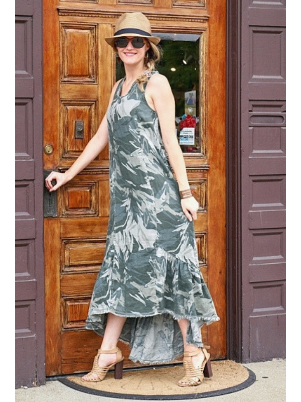 long boho dress on model with cuff at door