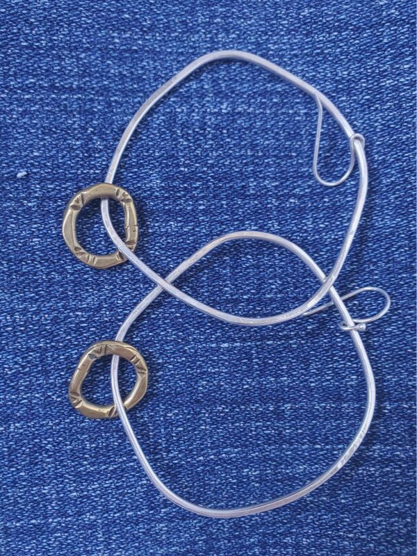 abstract hoop earrings on denim