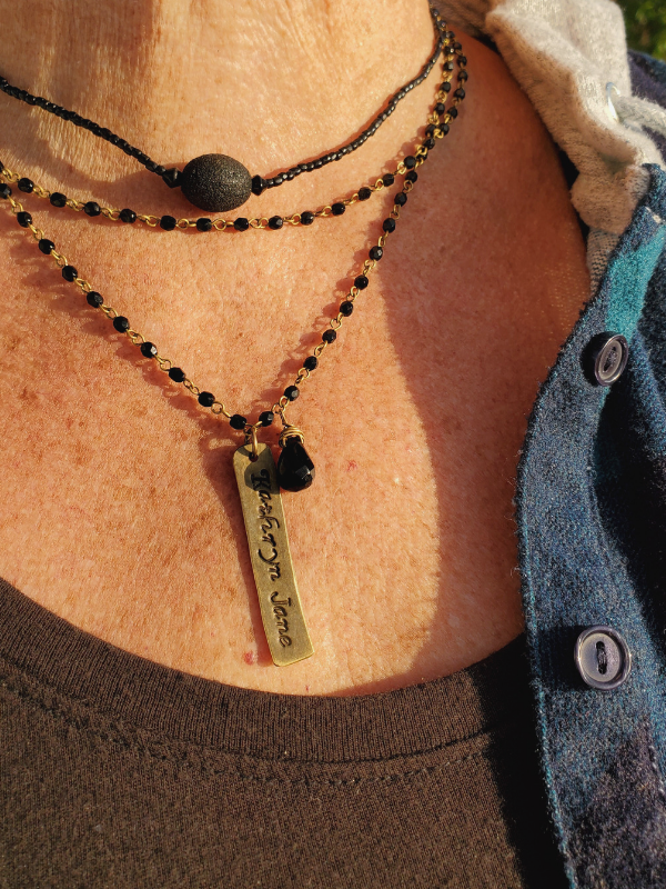 beaded layered bar necklace on female