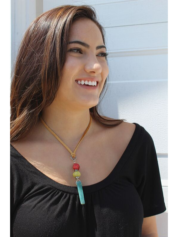 colorful stone necklace on model with back shirt