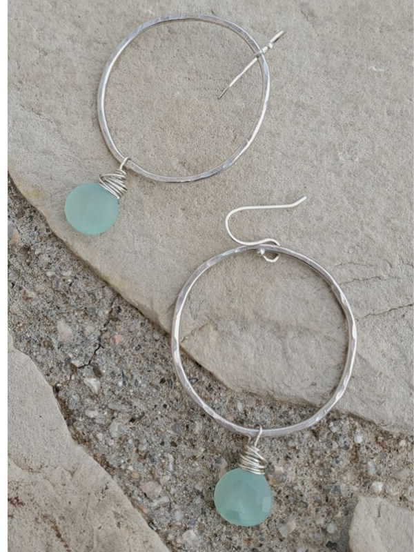 silver hoop aqua gemstone earrings on stone