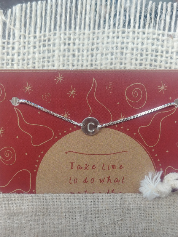 silver initial bracelet on jdavis jewelry card