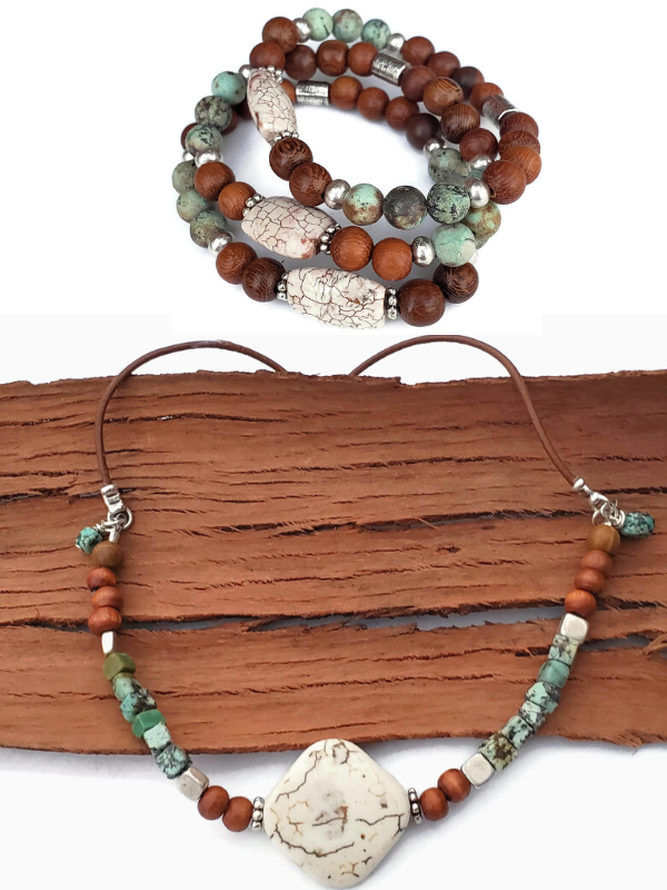 wood and turquoise jewelry on wood